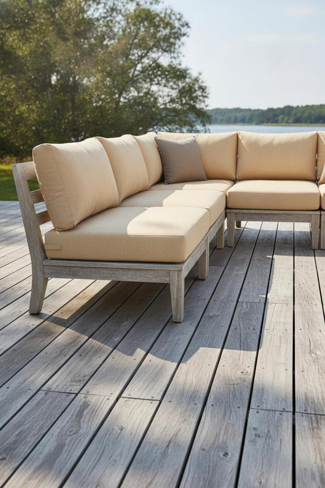 Sunbrella outdoor fabric for patio cushions on teak sectional sofa, showing vibrant color and no fading after years of use